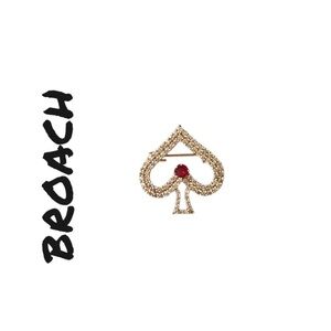 Elegant Gold and Red Spade Brooch